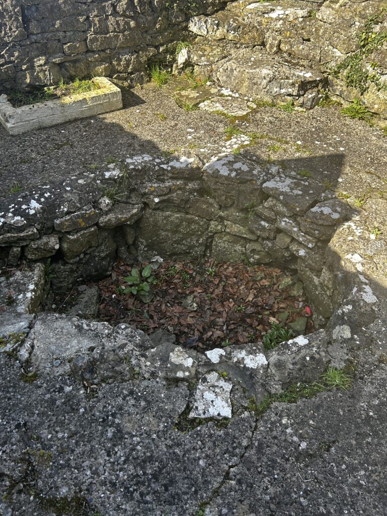 A closeup view of the dry Brigid's Well in Loughrea